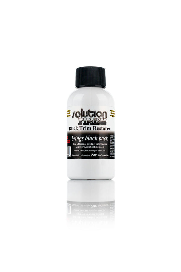 A bottle of Solution Finish on a white background.