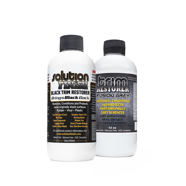 Solution Finish Black Trim Restorer and Fusion Grey Restorer bottles on a white background.
