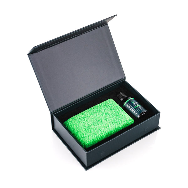 An opened package of Armour Detail Quartz Coating on a white background.