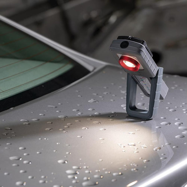 A closeup of the Sunmatch 3 on the back of a car shining its light.