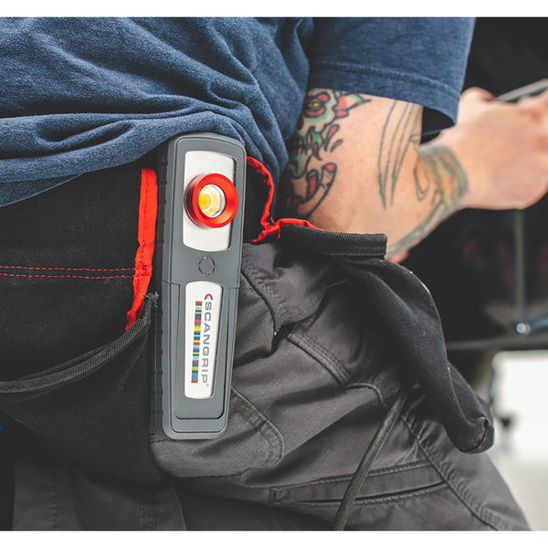 A closeup of the Sunmatch 3 hanging from some ones back pocket.