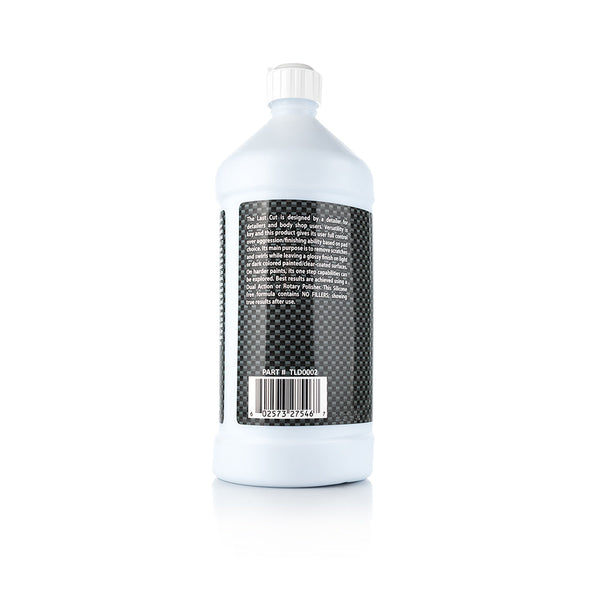 The back of a bottle of TLD The Last Cut on a white background.