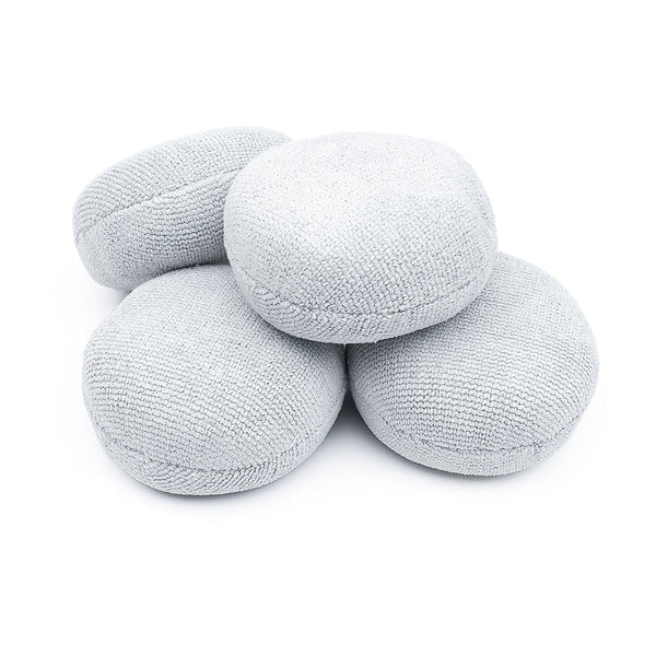 A 4-pack of Pearl Puck Applicators from The Rag Company in Ice Grey. These pearl weave microfiber applicators have a no-soak barriers inside them that prevents precious coating products from seeping into the sponge.