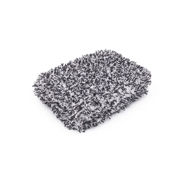 The Cyclone Ultra Wash Pad on a white background. The Pad is made of white and black microfiber