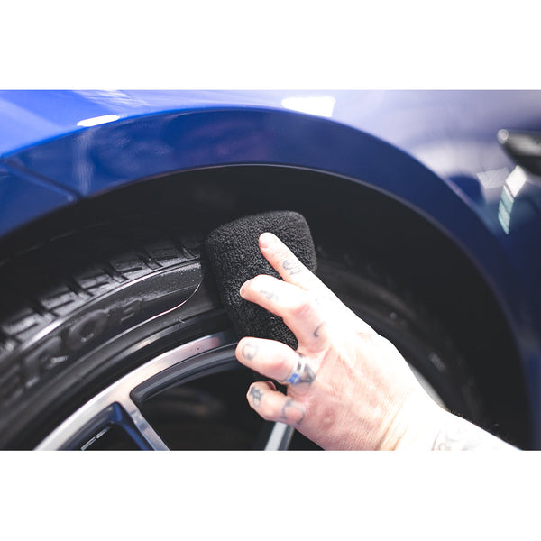 Koch Chemie Plast Star 1L applicator cleaning tire.