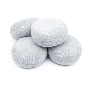 A 4-pack of Pearl Puck Applicators from The Rag Company in Ice Grey. These pearl weave microfiber applicators have a no-soak barriers inside them that prevents precious coating products from seeping into the sponge. 